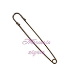 spilla di sicurezza, poncho